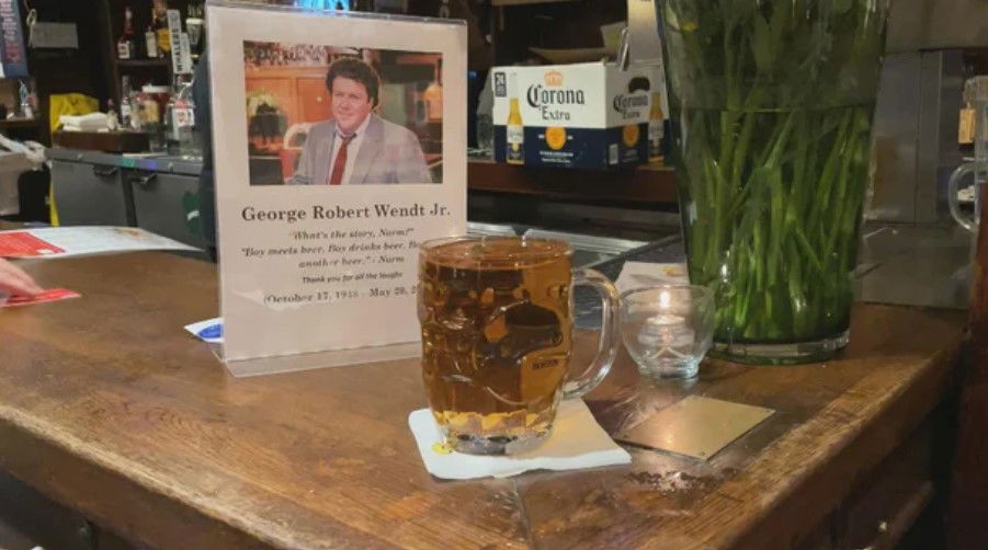 <i>WBZ via CNN Newsource</i><br/>Beer left on the bar at Cheers Boston after the death of George Wendt who played Norm in the sitcom.