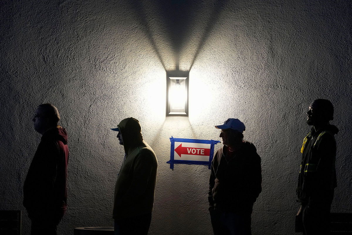 <i>Matt York/AP via CNN Newsource</i><br/>Voters stand in line outside a polling place at Madison Church in Phoenix in November 2024.