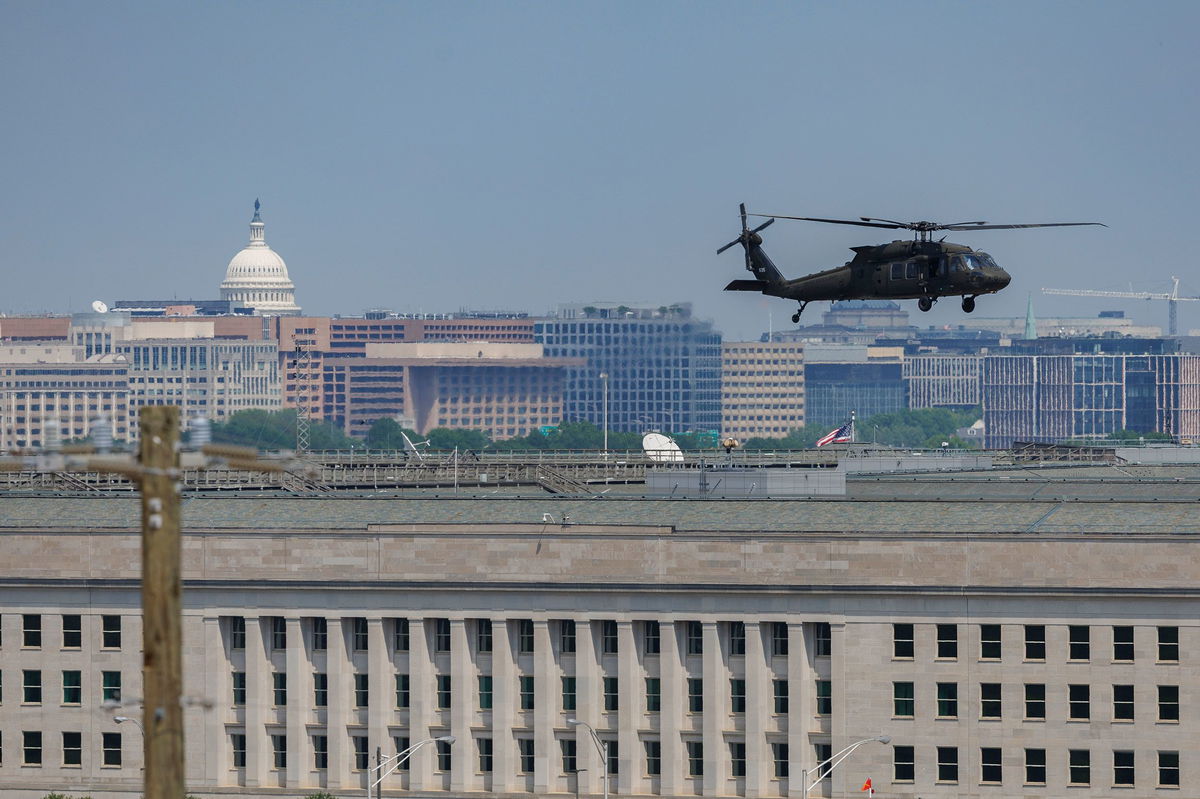 <i>Tom Brenner/For The Washington Post/Getty Images via CNN Newsource</i><br/>A US Army Blackhawk helicopter flies over The Pentagon on May 1.