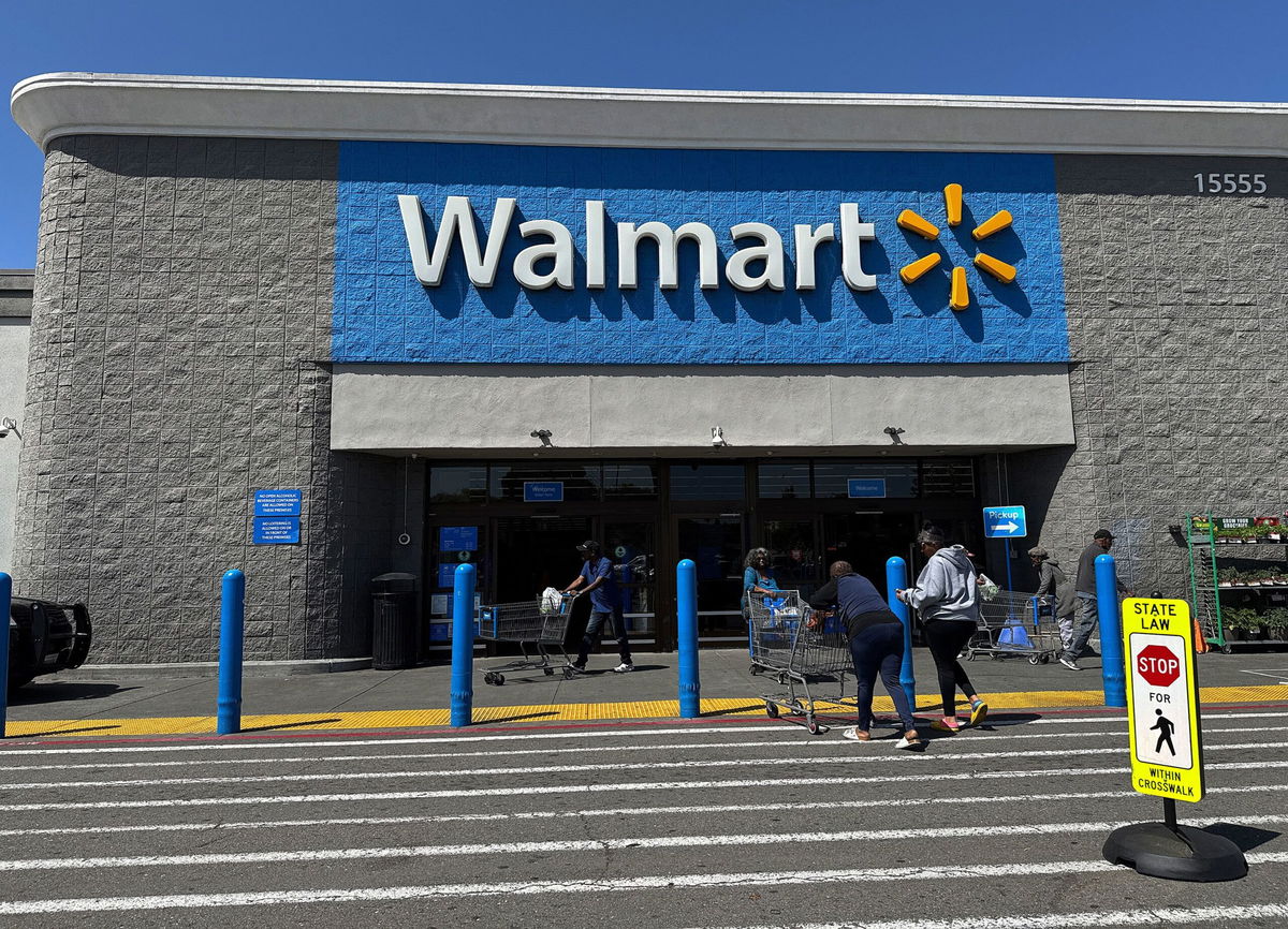 <i>Justin Sullivan/Getty Images via CNN Newsource</i><br/>Customers enter a Walmart store on April 9