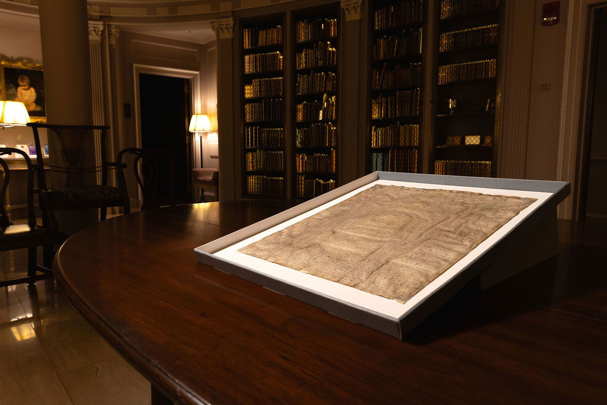 <i>Lorin Granger/Harvard Law School/AP via CNN Newsource</i><br/>A rare copy of Magna Carta from 1300 sits in a display case at Harvard Law School in Cambridge