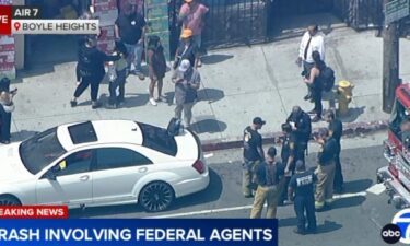 Aerial video from AIR7 showed LAPD officers and Los Angeles Fire Department firefighters at the crash site.
