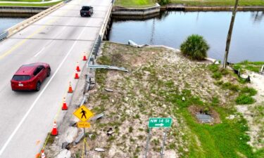 Smashed guardrails leading to the canal