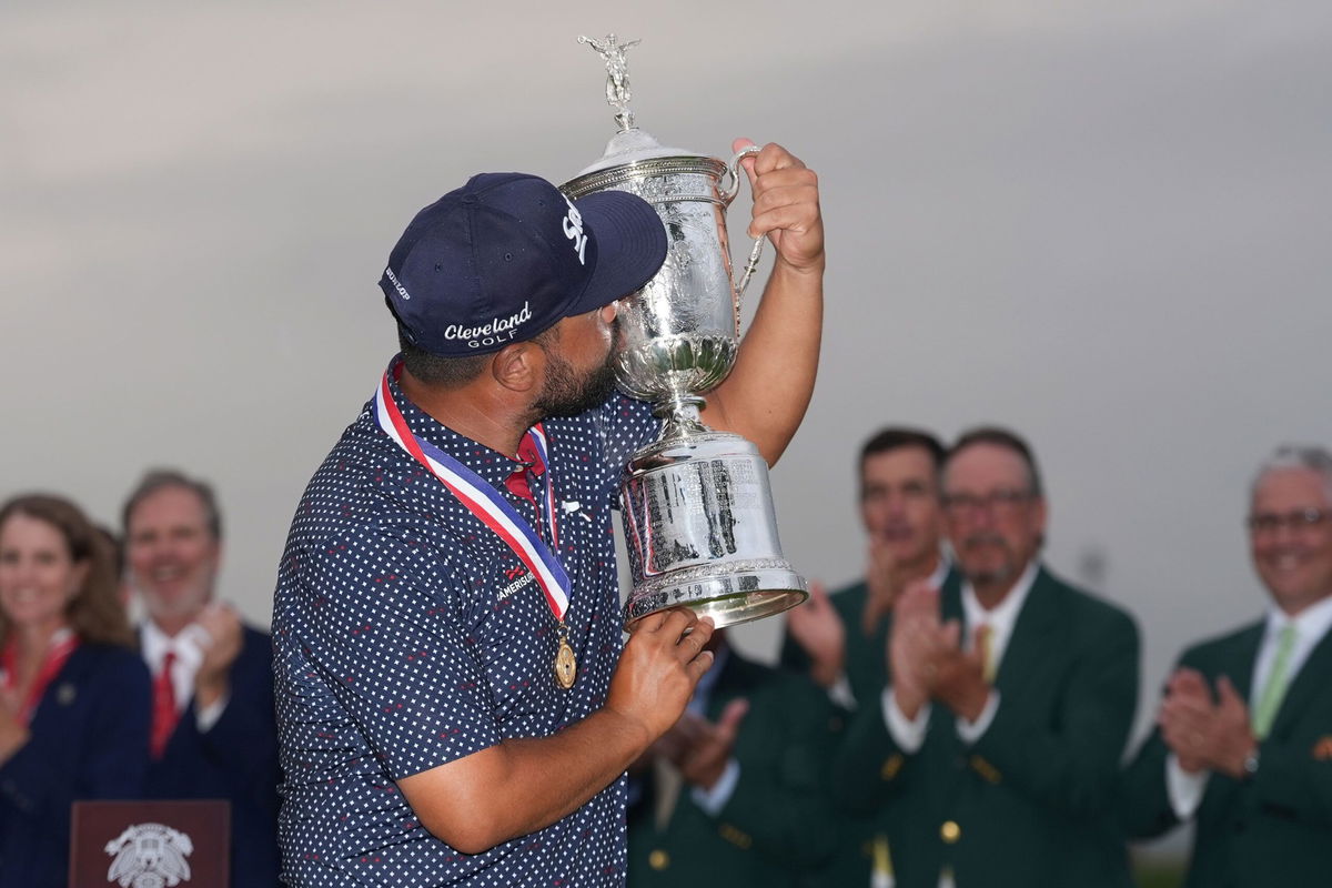 <i>Bill Streicher/Imagn Images/Reuters via CNN Newsource</i><br/>J.J. Spaun putts on the 18th green to win during the final round of the U.S. Open golf tournament.