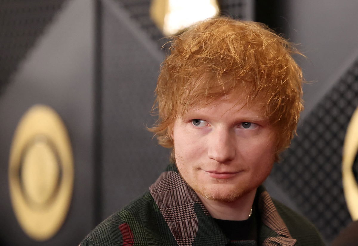 <i>Mario Anzuoni/Reuters/File via CNN Newsource</i><br/>Ed Sheeran poses on the red carpet as he attends the 66th Annual Grammy Awards in Los Angeles