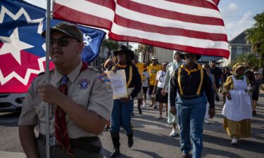 A march reenactment celebrates Juneteenth in Galveston