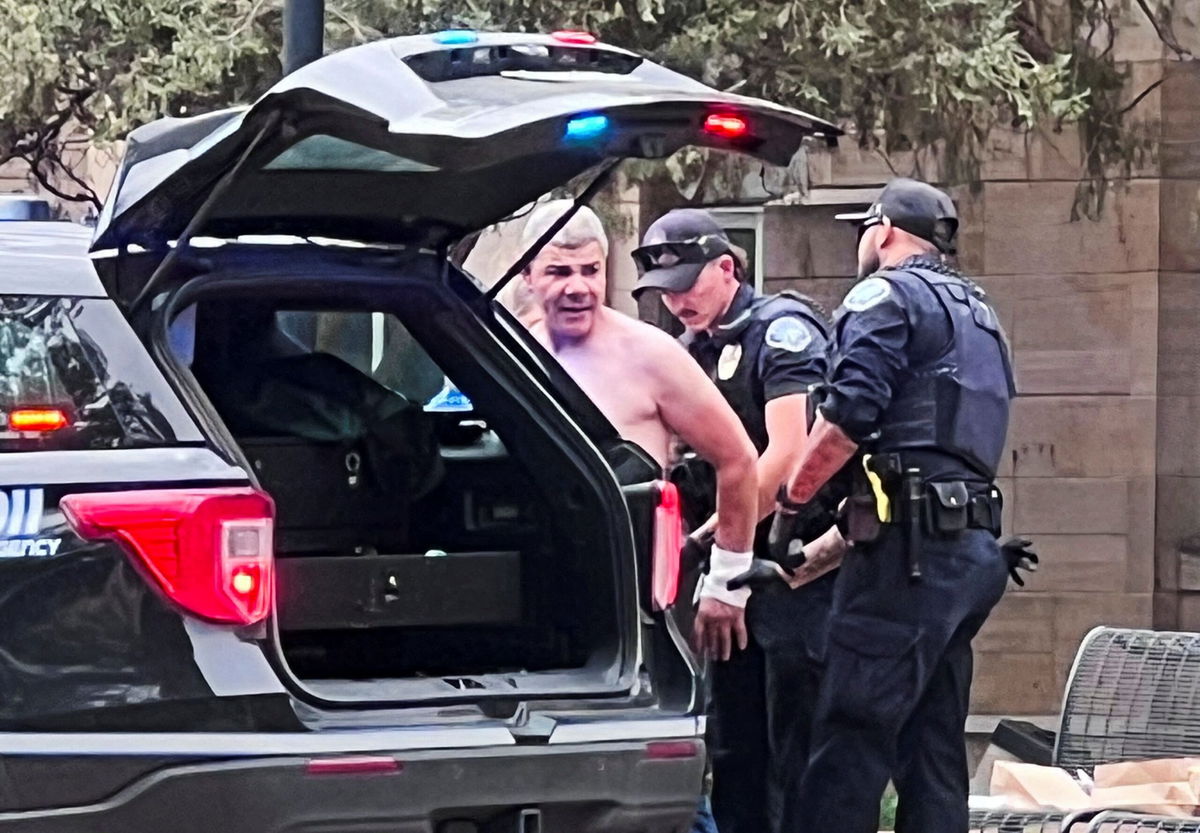 <i>OpusObscura/X/Reuters via CNN Newsource</i><br/>Law enforcement officers detain a suspect after an attack that injured multiple people in Boulder