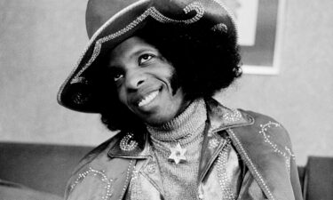 Sly Stone poses for a photo in London in 1973. Stone's family announced he died on June 9.