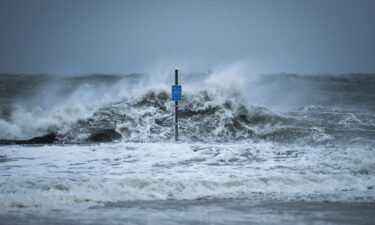 Waves crash on the beach in January 2016