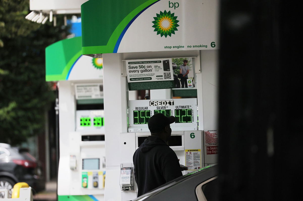 <i>Michael M. Santiago/Getty Images via CNN Newsource</i><br/>A person pumps gas at a BP gas station in June 2023 in Brooklyn.