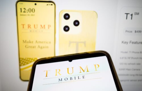 The Trump Mobile logo appears on a smartphone screen