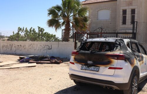 Israeli settlers set fire to homes and vehicles in an attack Palestinian officials say killed three people.