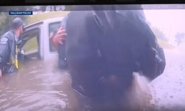 Bodycam video showed the rescue of a driver from a nearly submerged truck under a railroad bridge in Sallisaw.