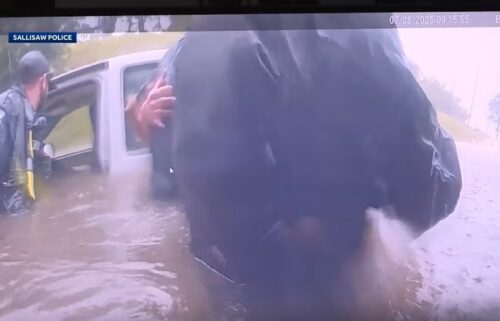 Bodycam video showed the rescue of a driver from a nearly submerged truck under a railroad bridge in Sallisaw.