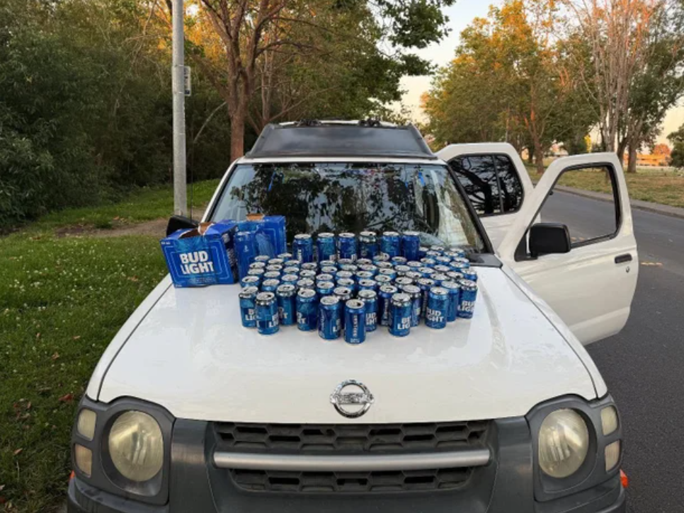 <i>KPIX/Cotati Police Department via CNN Newsource</i><br/>Empty beer cans are arranged on an older model Nissan Xterra following a DUI arrest on June 29.