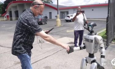 A human-sized robot casually walking down 7 Mile Road in Detroit has captured viral attention online and stopped pedestrians in their tracks.