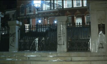 The entrance to the Massachusetts State House in Boston was vandalized early Wednesday morning and the bomb squad was later called in.