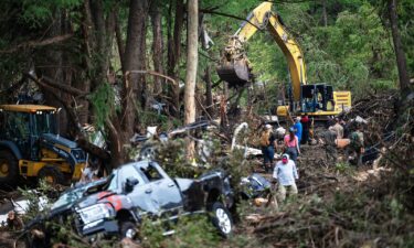 First responders carry out search and rescue operations near the Guadalupe River after a flash flood swept through the area.