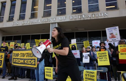 Demonstrators gather outside the offices of the U.S. Department of Education in Washington