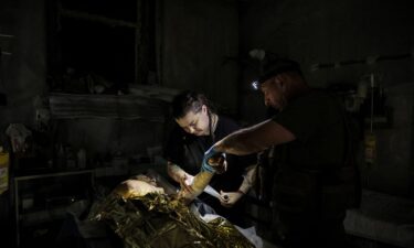 Combat medics of the Ukrainian Armed Forces treat an injured Ukrainian serviceman near Chasiv Yar on July 25.