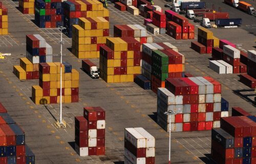 Shipping containers are stacked at the Port of Oakland in Oakland