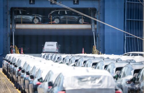Cars loaded onto a carrier ship in Germany for export. The lower tariffs on US imports from the EU won't go into effect as early as previously believed