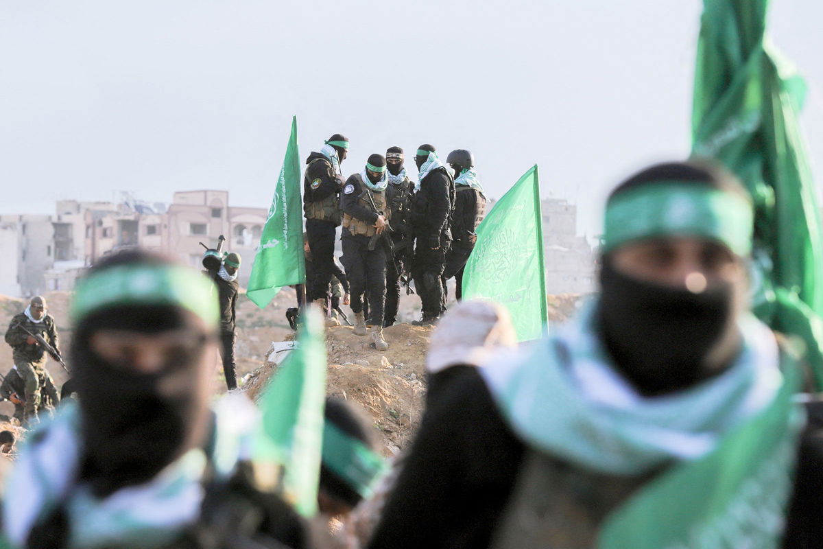 <i>Saeed Jaras/Middle East Images/AFP/Getty Images/File via CNN Newsource</i><br/>Hamas fighters gather in Khan Yunis on February 20