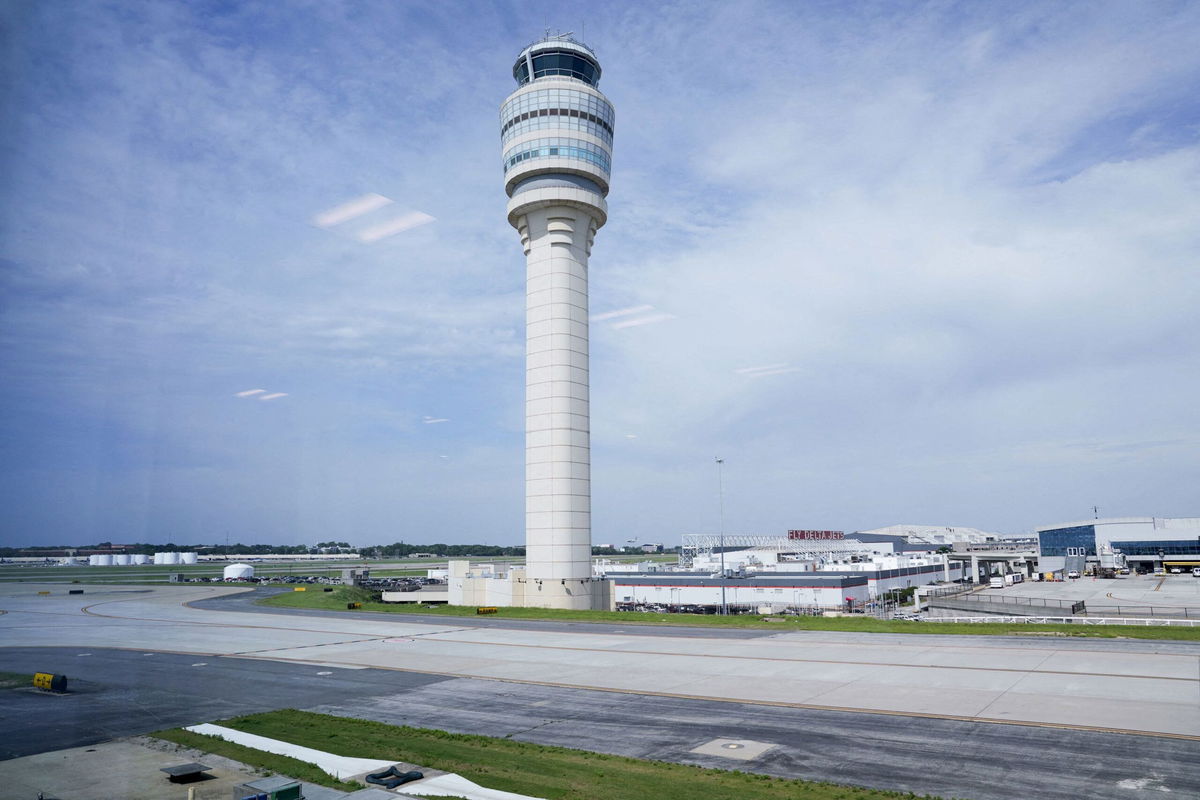 <i>Megan Varner/Reuters via CNN Newsource</i><br/>The air traffic control tower is seen from the Hartsfield-Jackson Atlanta International Airport terminal