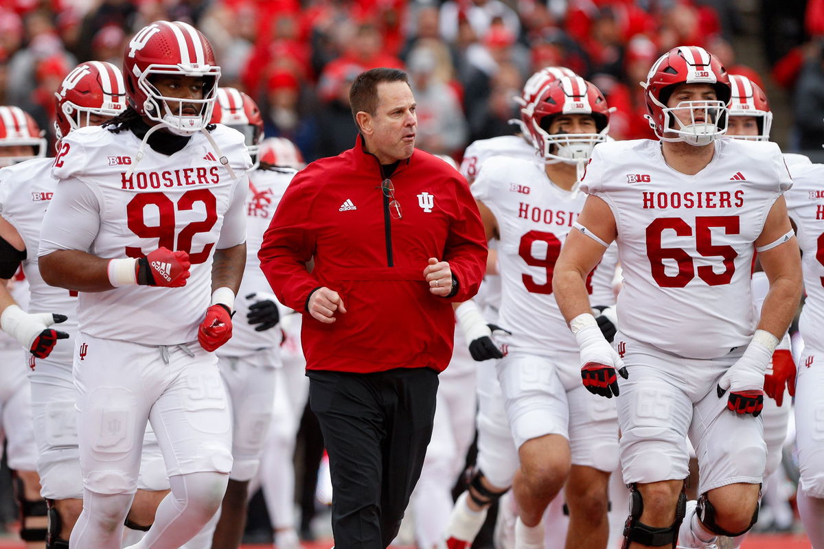 <i>Robert Goddin/Imagn Images/Reuters via CNN Newsource</i><br/>Indiana wide receiver Elijah Sarratt catches a touchdown pass against Michigan State on Saturday. Sarratt was one of the former James Madison players who transferred to play for Cignetti.