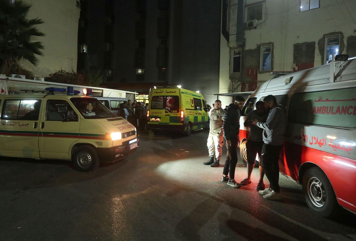 <i>Mohammad Zaatari/AP via CNN Newsource</i><br/>Ambulances take casualties from the Ain al-Hilweh refugee camp in southern Lebanon to a hospital on Tuesday.