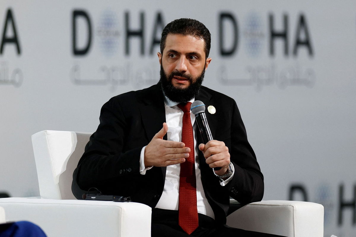 <i>Ibraheem Abu Mustafa/Reuters via CNN Newsource</i><br/>Syrian President Ahmed Al-Sharaa speaks as he attends the 23rd edition of the annual Doha Forum