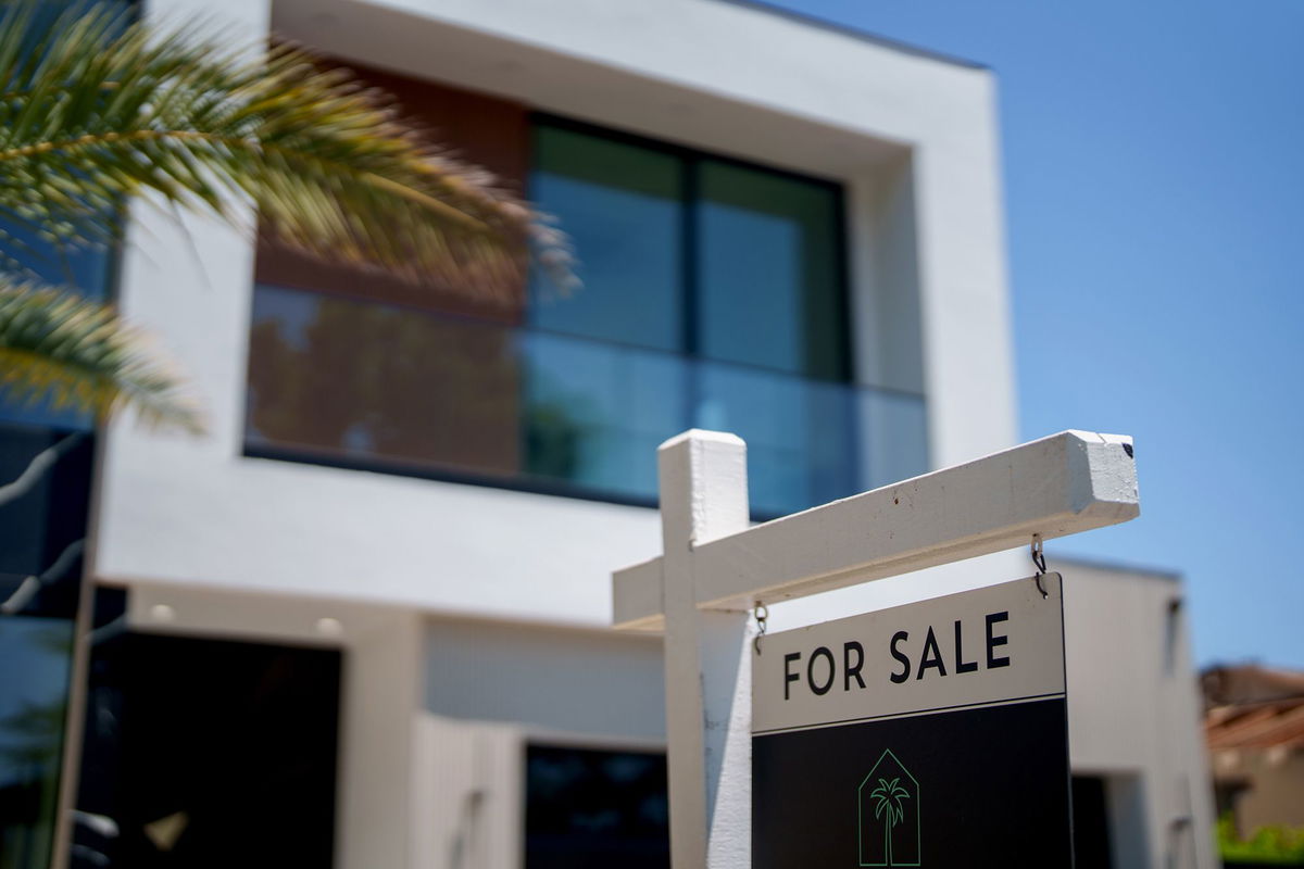 <i>Eric Thayer/Bloomberg/Getty Images via CNN Newsource</i><br/>A "For Sale" sign in front of a home in the Encino neighborhood of Los Angeles